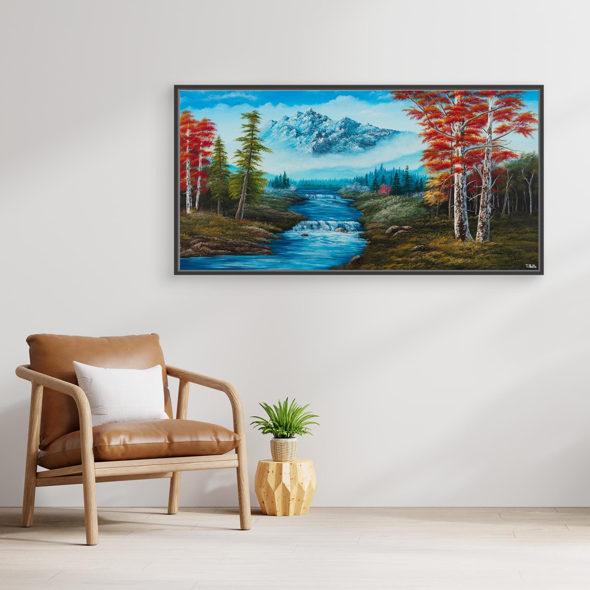 Premium canvas art print showing big mountains and an extensive forest landscape with red trees and a small river with a waterfall, printed on high-quality canvas with vibrant colors, displayed in a modern living room.