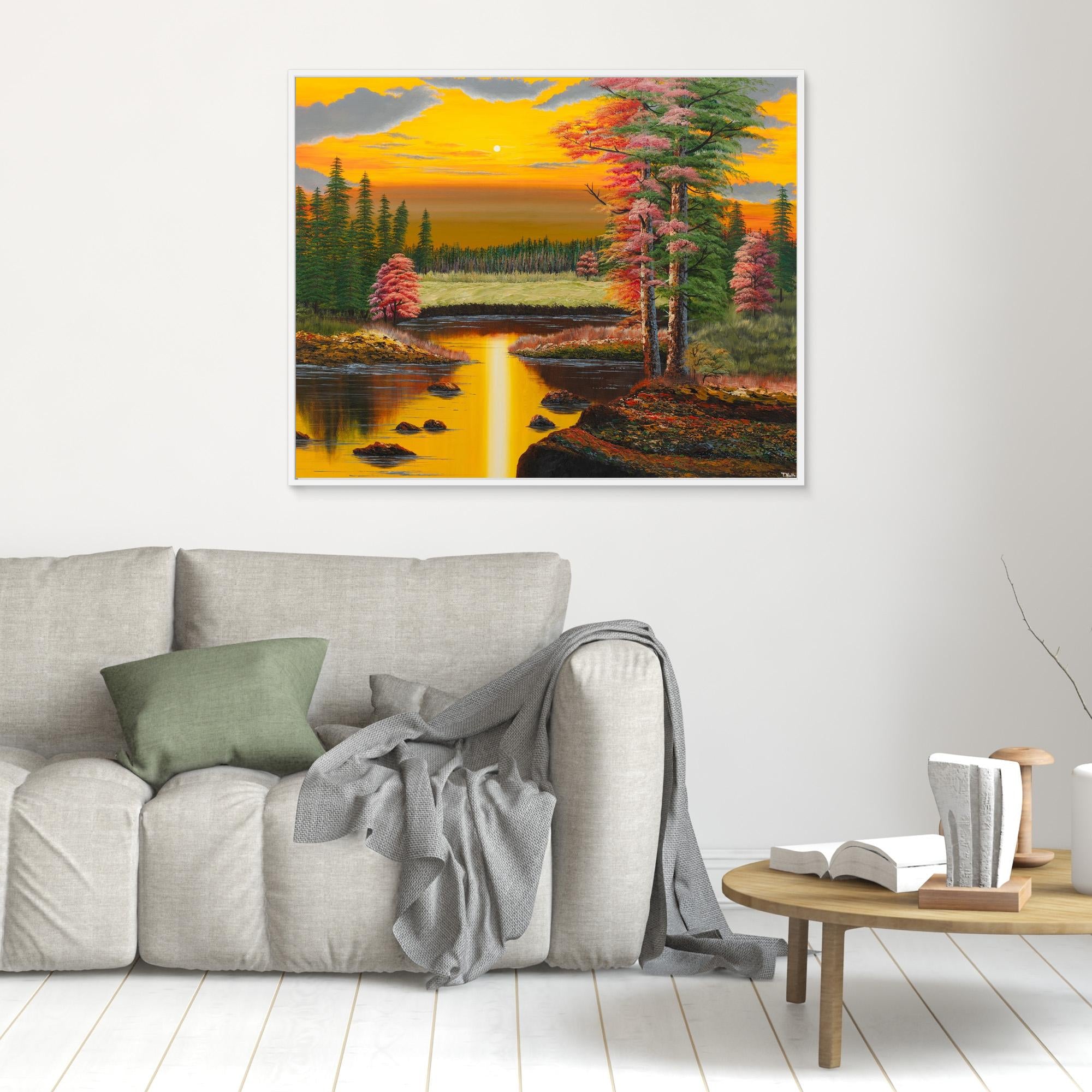 Premium canvas art print showing a warm autumn forest landscape in the yellowish light of a sunset, a big lake and lots of green and red trees, printed on high-quality canvas with vibrant colors, hanging on the wall in a modern living room.