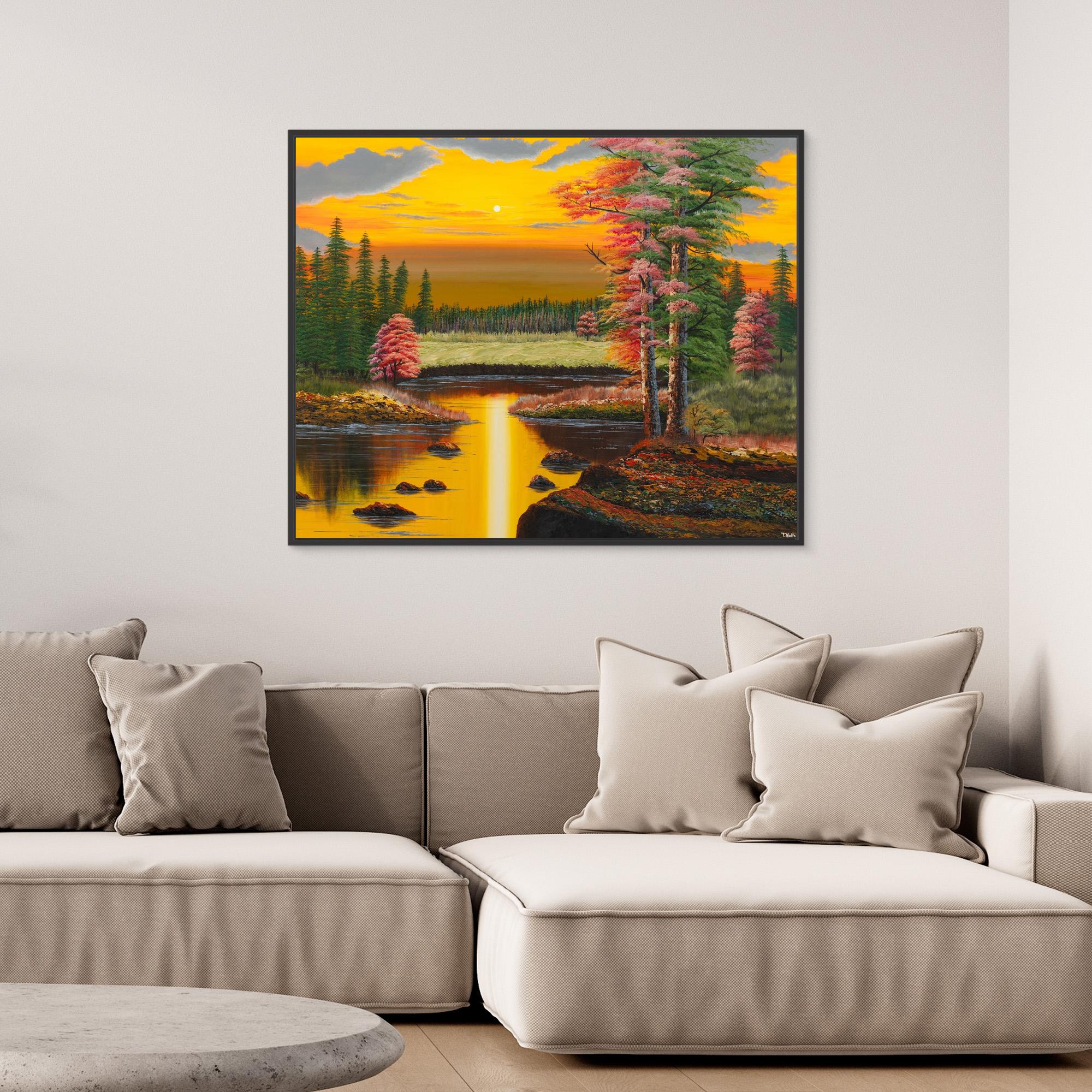 Premium canvas art print showing a warm autumn forest landscape in the yellowish light of a sunset, a big lake and lots of green and red trees, printed on high-quality canvas with vibrant colors, hanging on the wall in a modern living room.