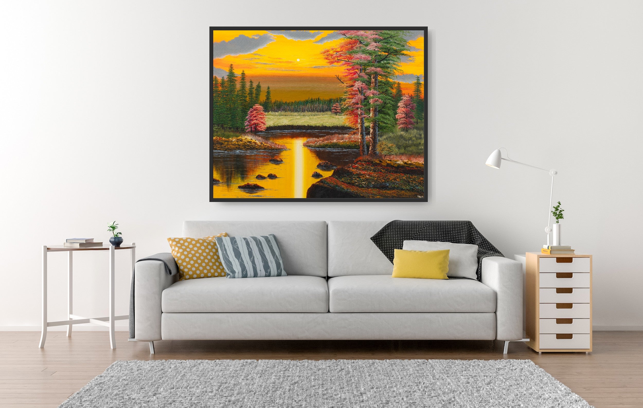 Premium canvas art print showing a warm autumn forest landscape in the yellowish light of a sunset, a big lake and lots of green and red trees, printed on high-quality canvas with vibrant colors, hanging on the wall in a modern living room over a sofa.